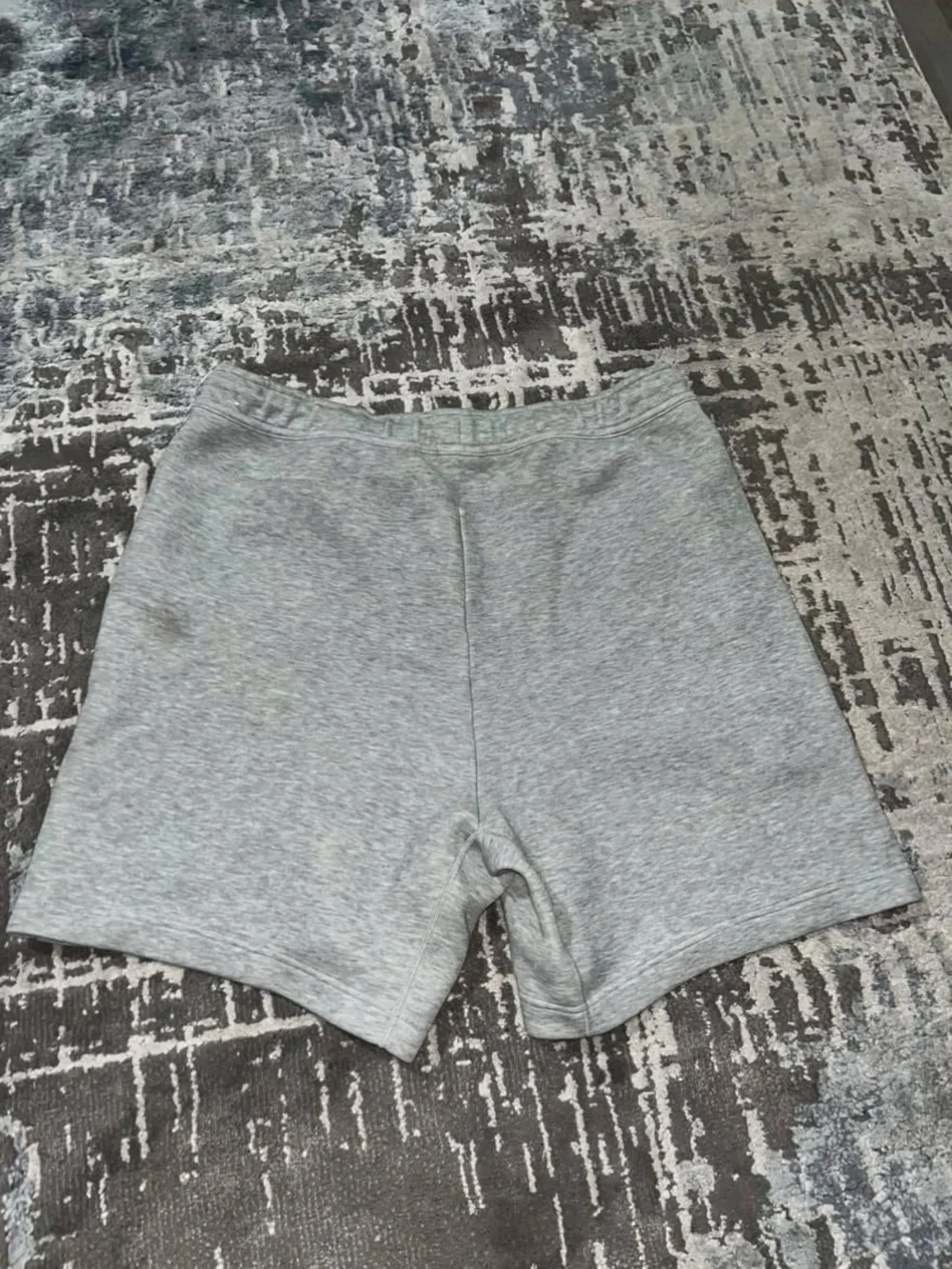 Nike Men's Light Gray Athletic Fleece Shorts with Black Accents